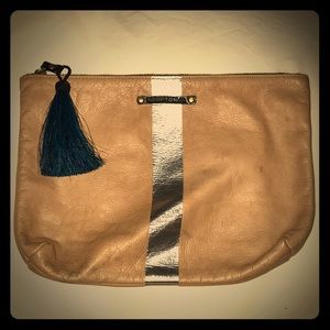 Silver stripe leather clutch.